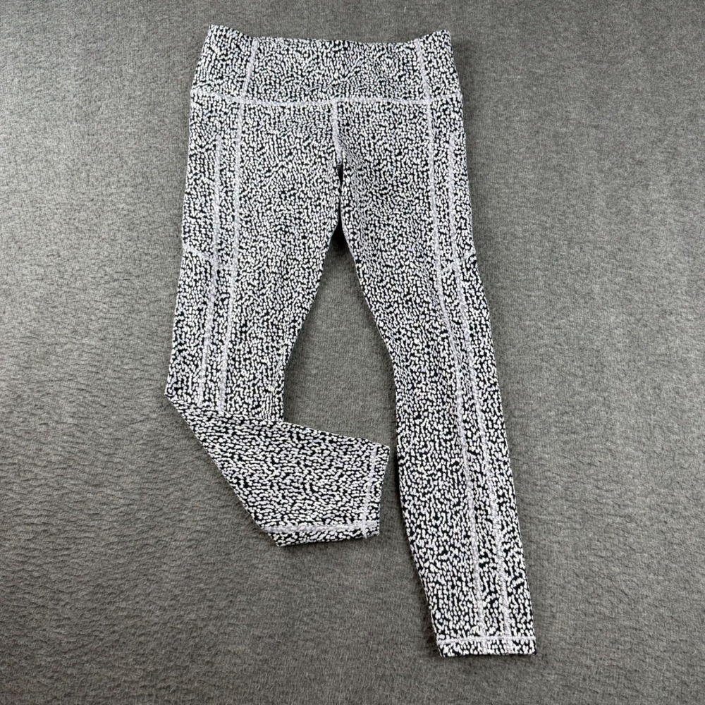 Athleta Salutation Stash Pocket Leggings Women's M Black White Speckled